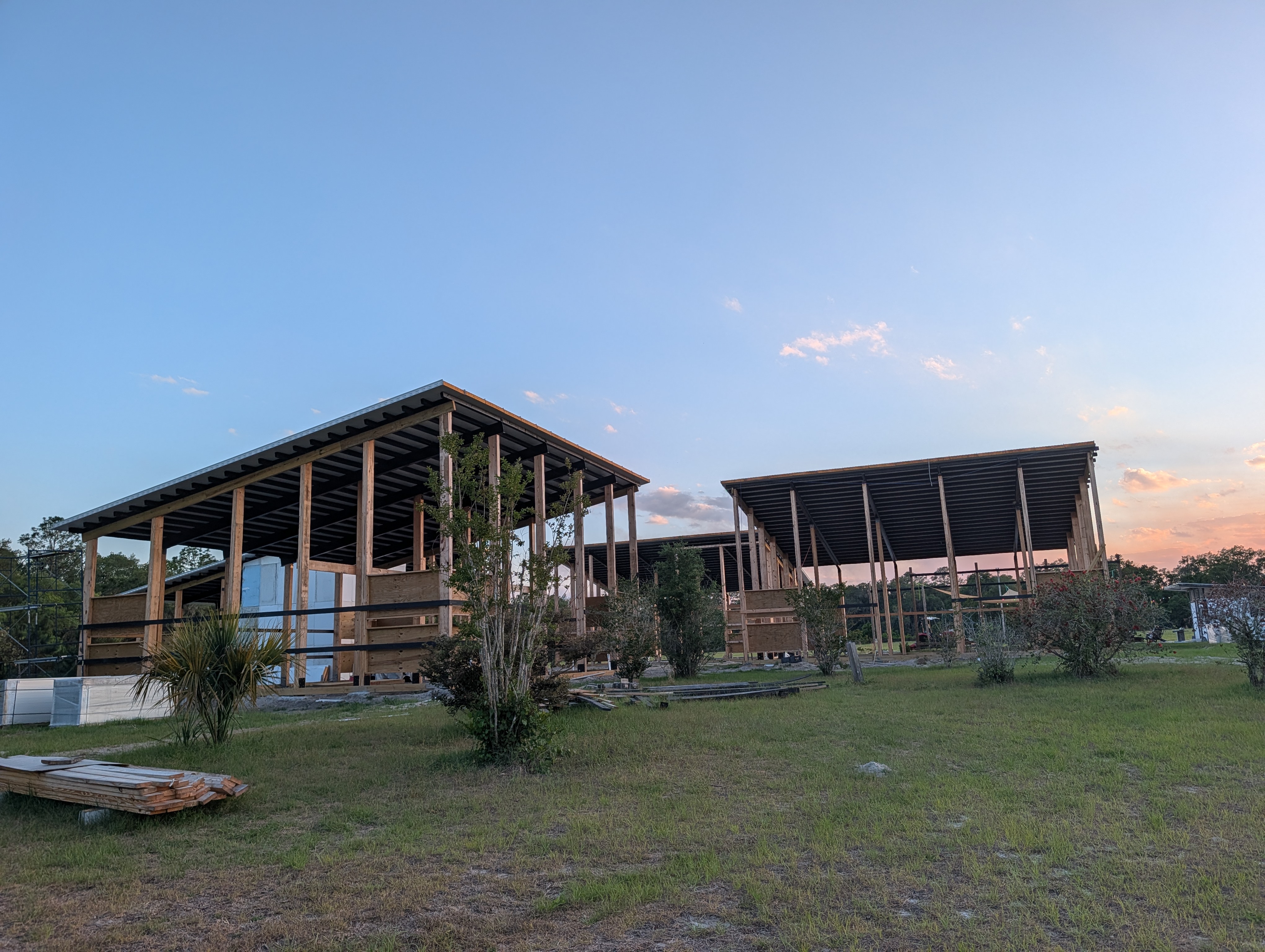 FarmSpace mono-slope structures at sunset